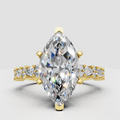 Marquise diamond ring with pear and round side stones