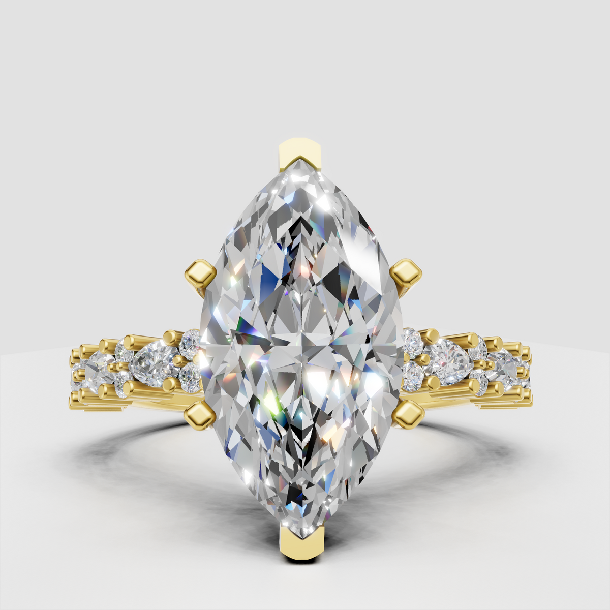 Marquise diamond ring with pear and round side stones