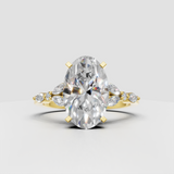 Oval cut diamond engagement ring with marquise side stones