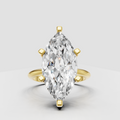 Marquise diamond cathedral solitaire engagement ring in polished yellow gold