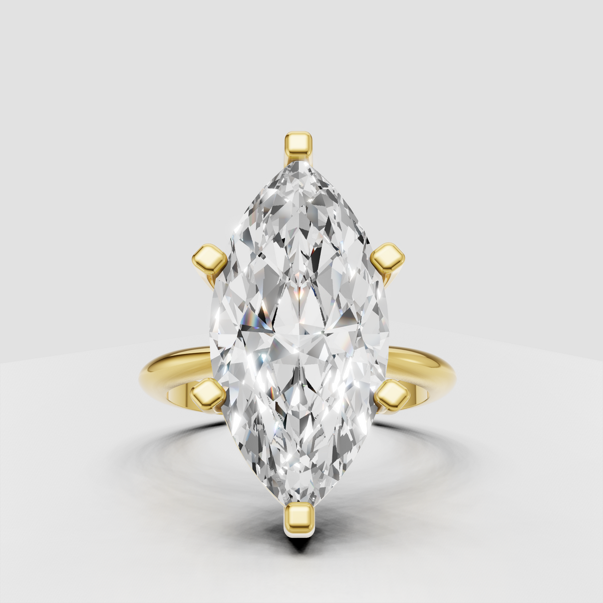 Marquise diamond cathedral solitaire engagement ring in polished yellow gold