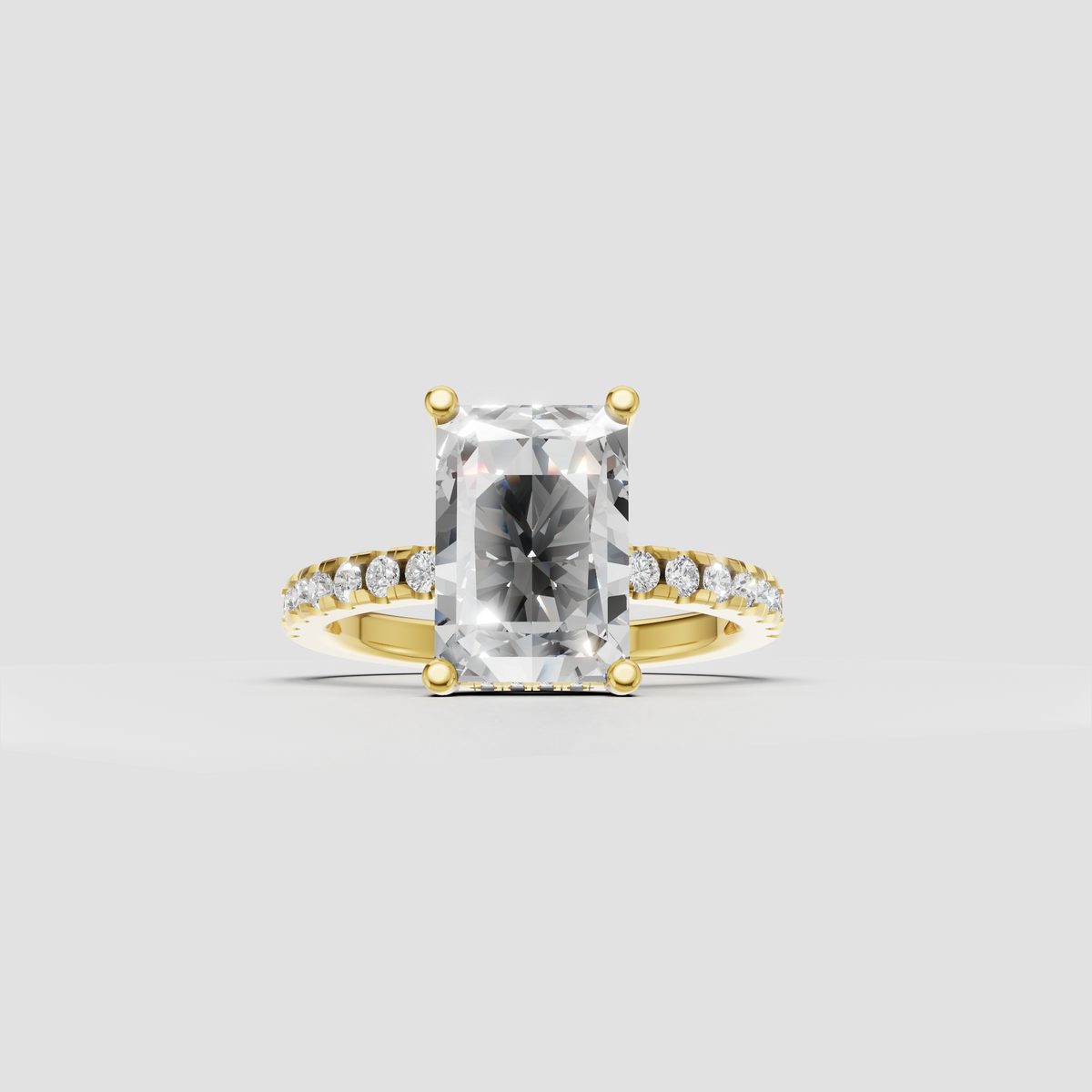 Radiant cut diamond hidden halo engagement ring in polished yellow gold