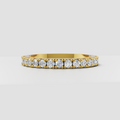 Round cut diamond eternity band with rose gold  detailing