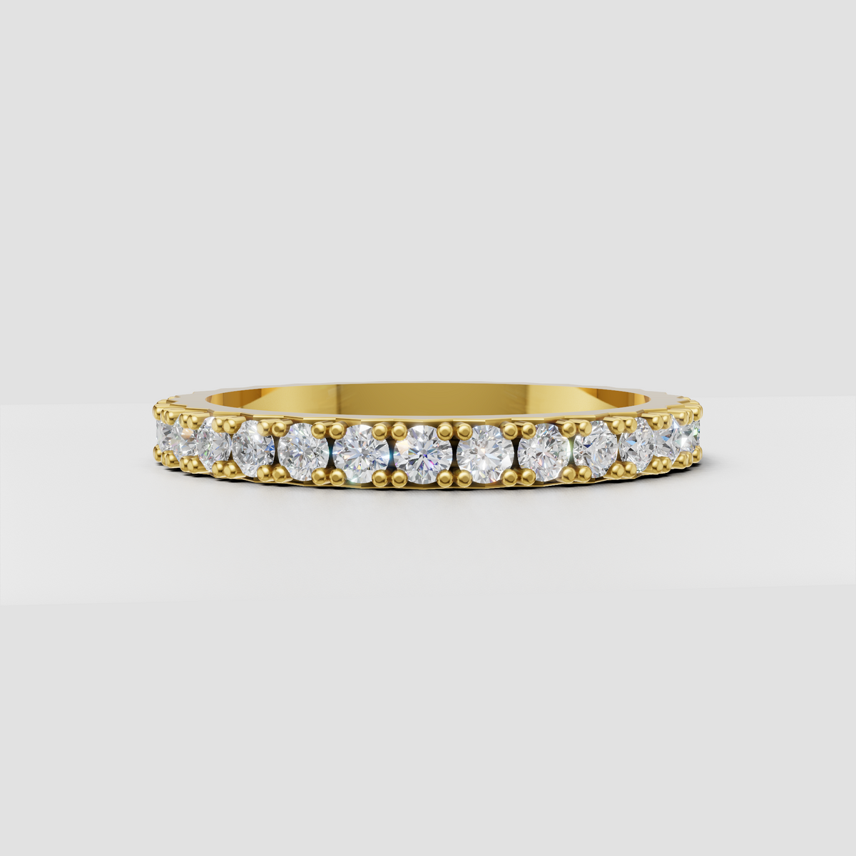 Round cut diamond eternity band with rose gold  detailing