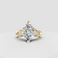 Marquise diamond floral engagement ring with prong setting and side stones