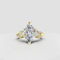 Marquise diamond floral engagement ring with prong setting and side stones