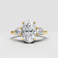 Oval cut diamond three stone engagement ring with prong setting