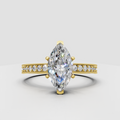 Marquise cut diamond vintage milgrain pavé engagement ring in yellow gold