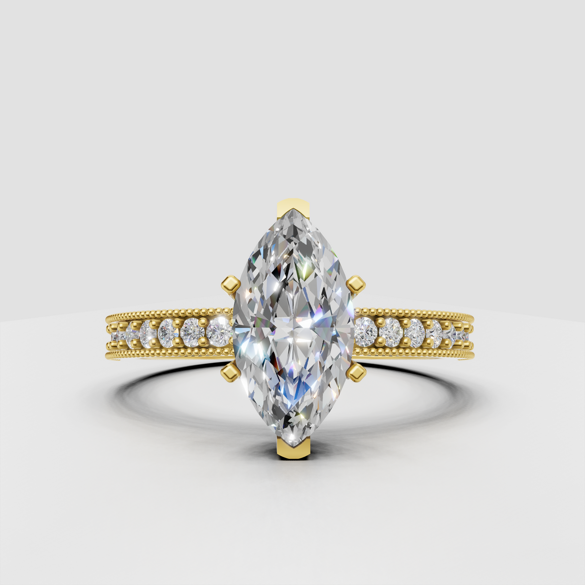 Marquise cut diamond vintage milgrain pavé engagement ring in yellow gold