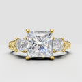 Princess cut diamond three stone vintage style ring in yellow gold
