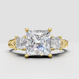 Princess cut diamond three stone vintage style ring in yellow gold