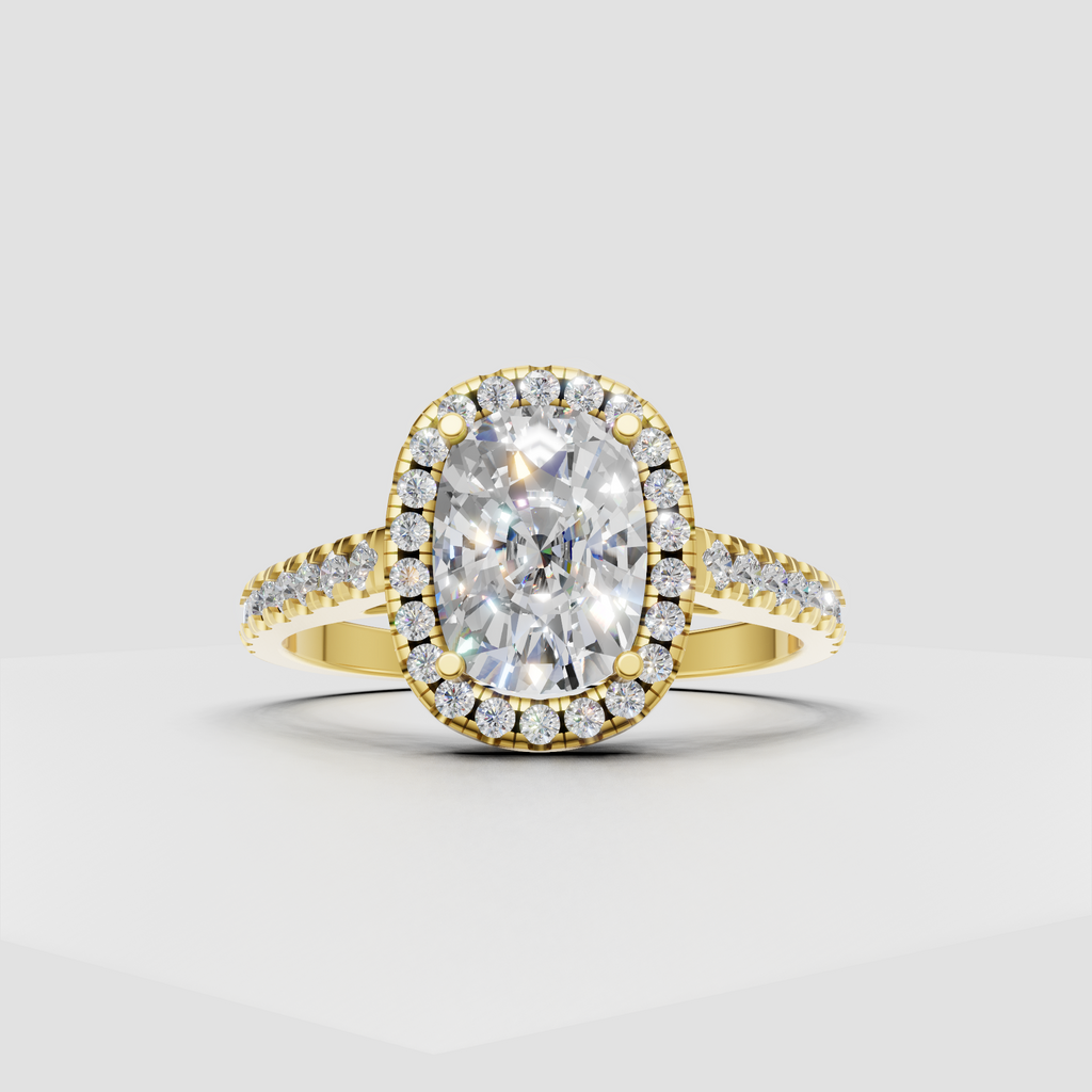 Elongated cushion cut diamond halo engagement ring in yellow gold with pavé band
