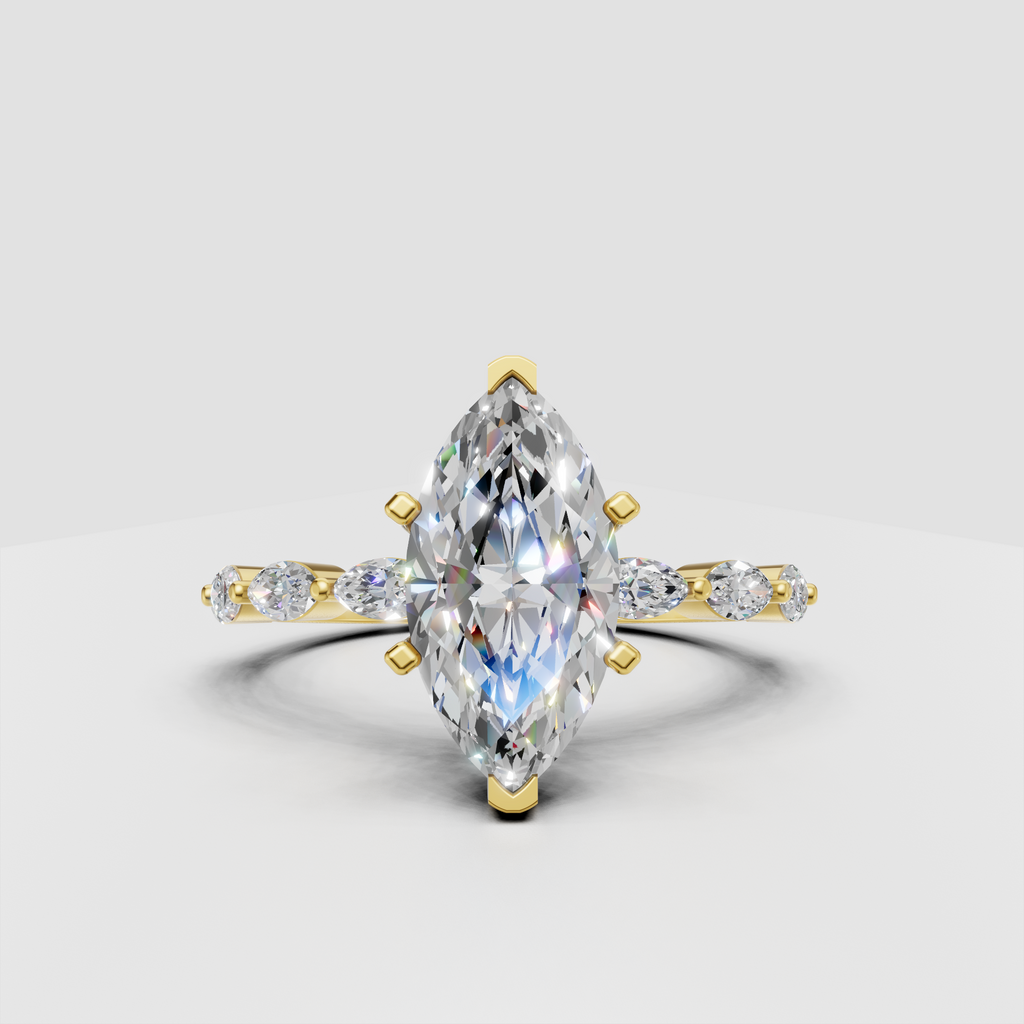 Marquise cut diamond cathedral engagement ring in yellow gold