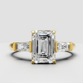 Emerald cut diamond four-prong engagement ring in polished yellow gold
