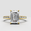 Emerald cut hidden halo diamond ring in yellow gold
