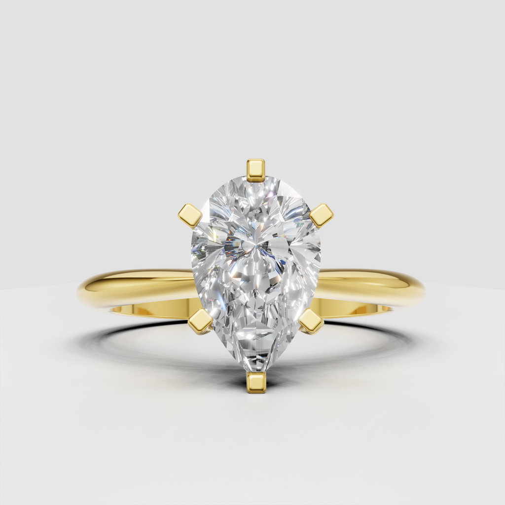Pear-shaped diamond six-prong solitaire engagement ring in polished rose gold