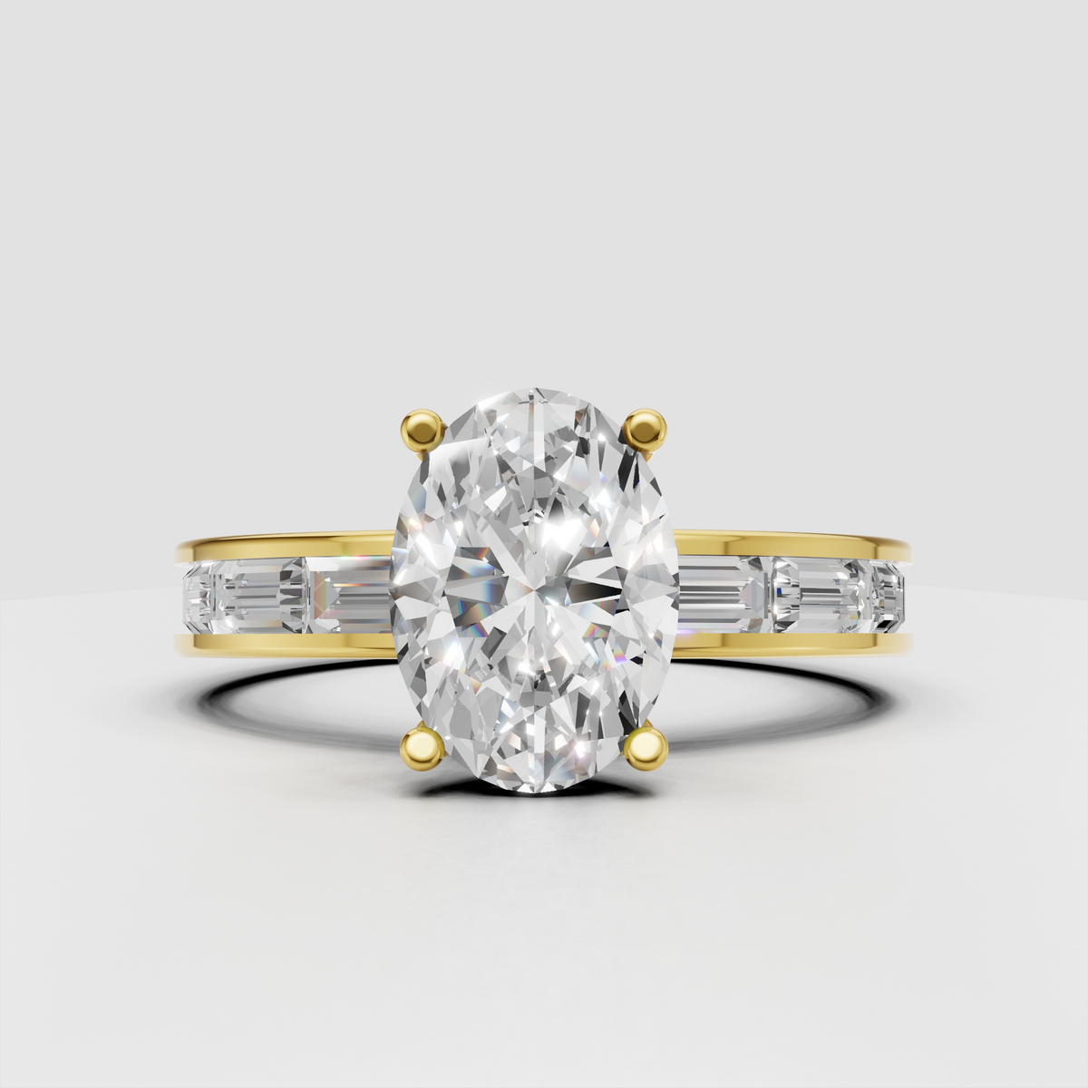 Oval diamond four-prong yellow gold engagement ring with baguette side stones