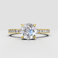 Round brilliant Diamond four-prong pavé solitaire engagement ring in polished yellow gold