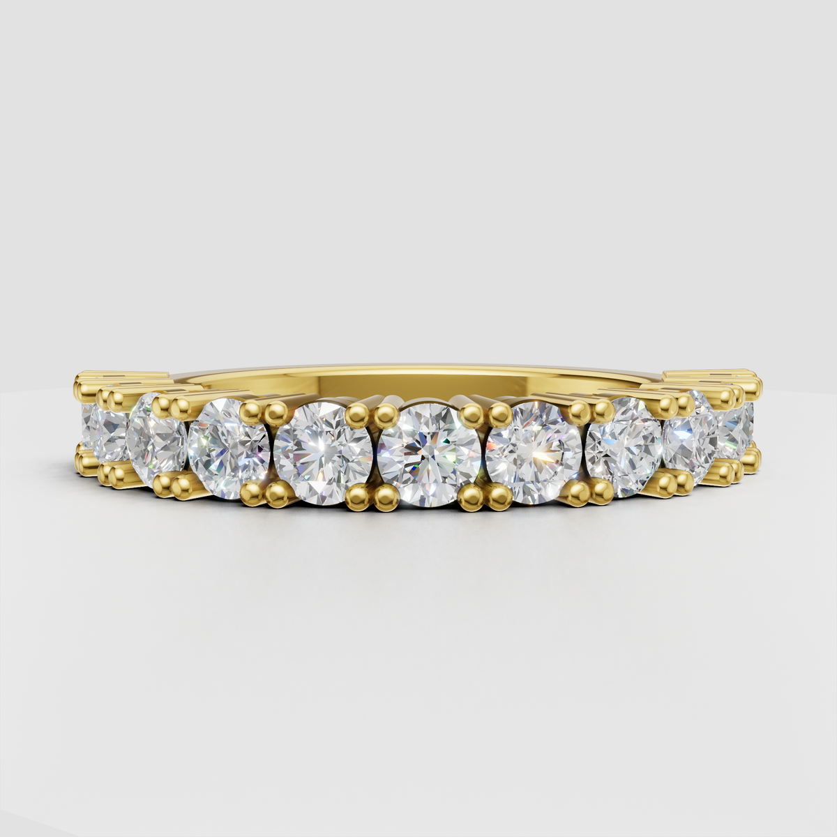 Round diamond half eternity band in yellow gold