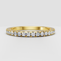 Round cut diamond half eternity wedding band in polished yellow gold