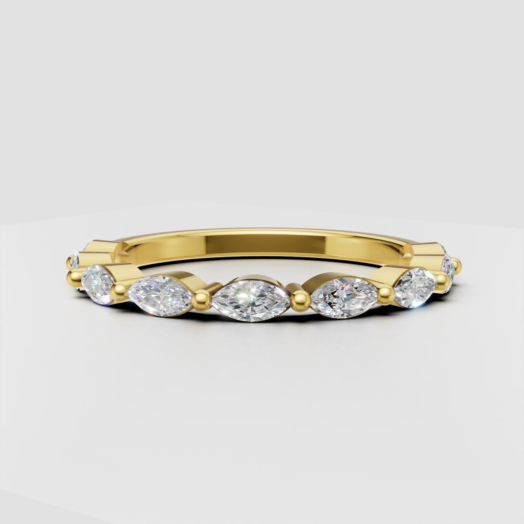 Yellow gold marquise diamond eternity ring with alternating round stones