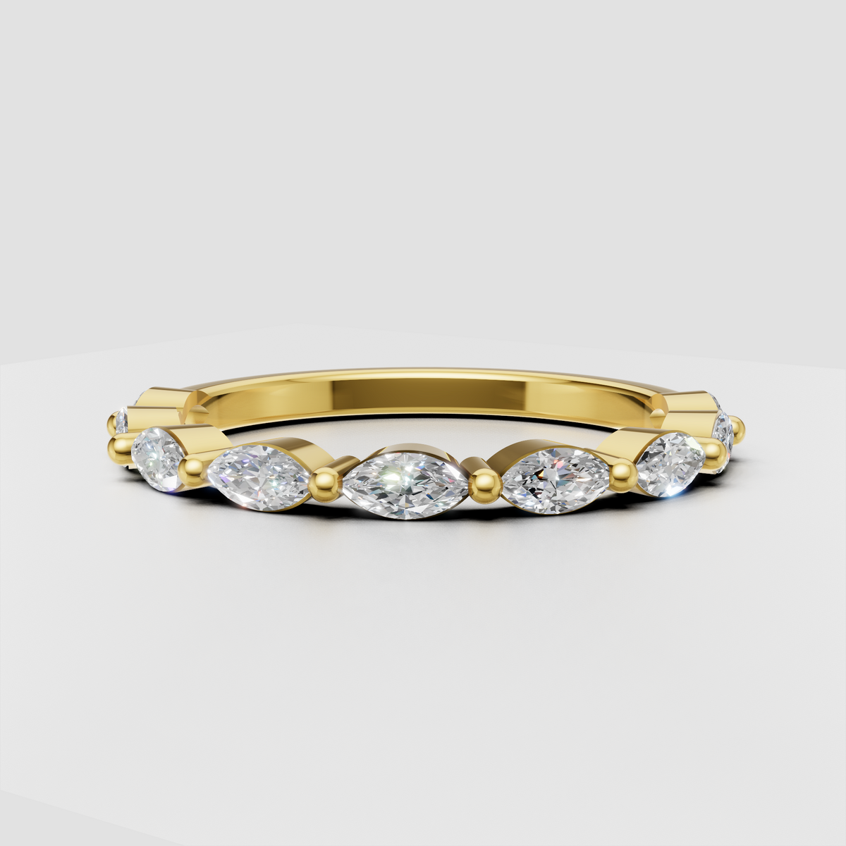 Yellow gold marquise diamond eternity ring with alternating round stones