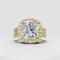 Cushion cut diamond halo engagement ring in polished yellow gold