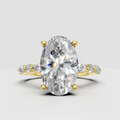 Oval cut diamond engagement ring in yellow gold