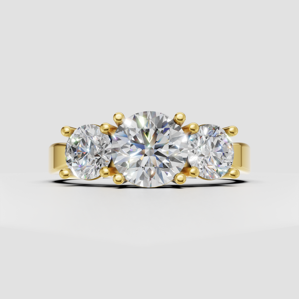 Round diamond three-stone engagement ring with pavé shoulders