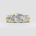 Round diamond three-stone engagement ring with pavé shoulders