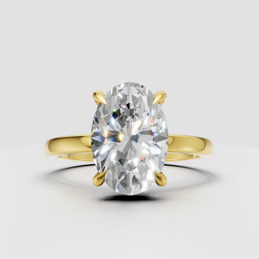 Oval cut diamond hidden halo ring in yellow gold