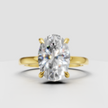 Oval cut diamond hidden halo ring in yellow gold