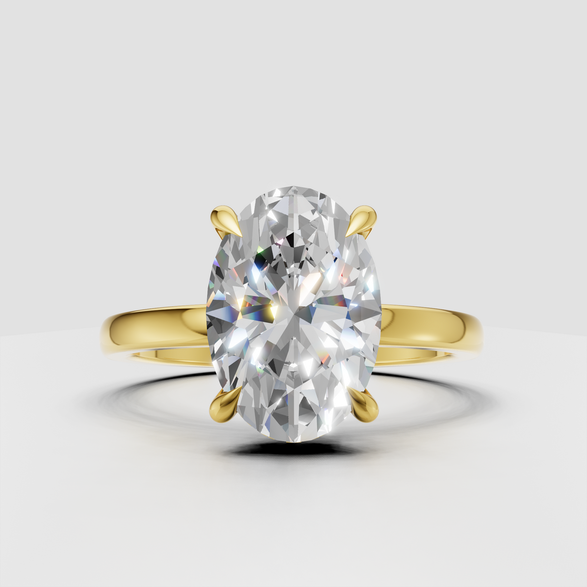 Oval cut diamond hidden halo ring in yellow gold
