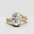 Oval cut diamond bypass ring in yellow gold