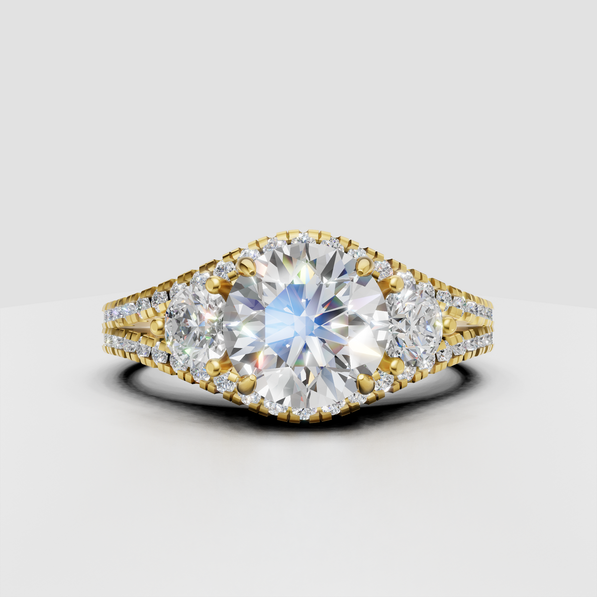 Round cut diamond three stone engagement ring in yellow gold