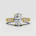 Oval diamond vintage engagement ring with four-prong setting and milgrain band