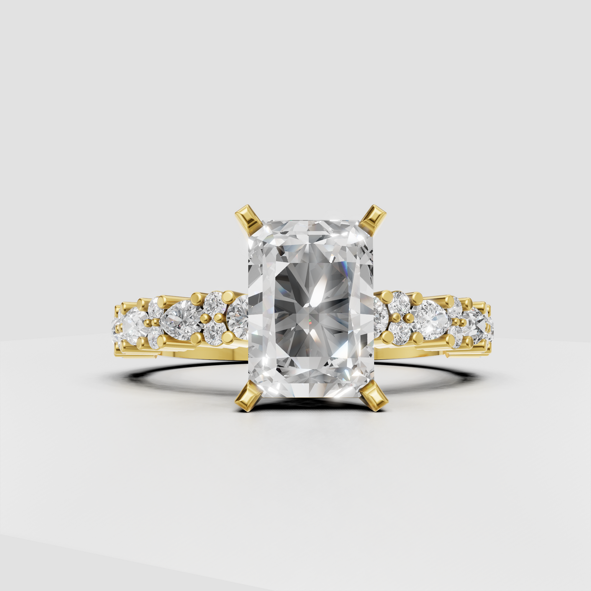 Radiant cut diamond solitaire ring with accent diamonds in polished yellow gold