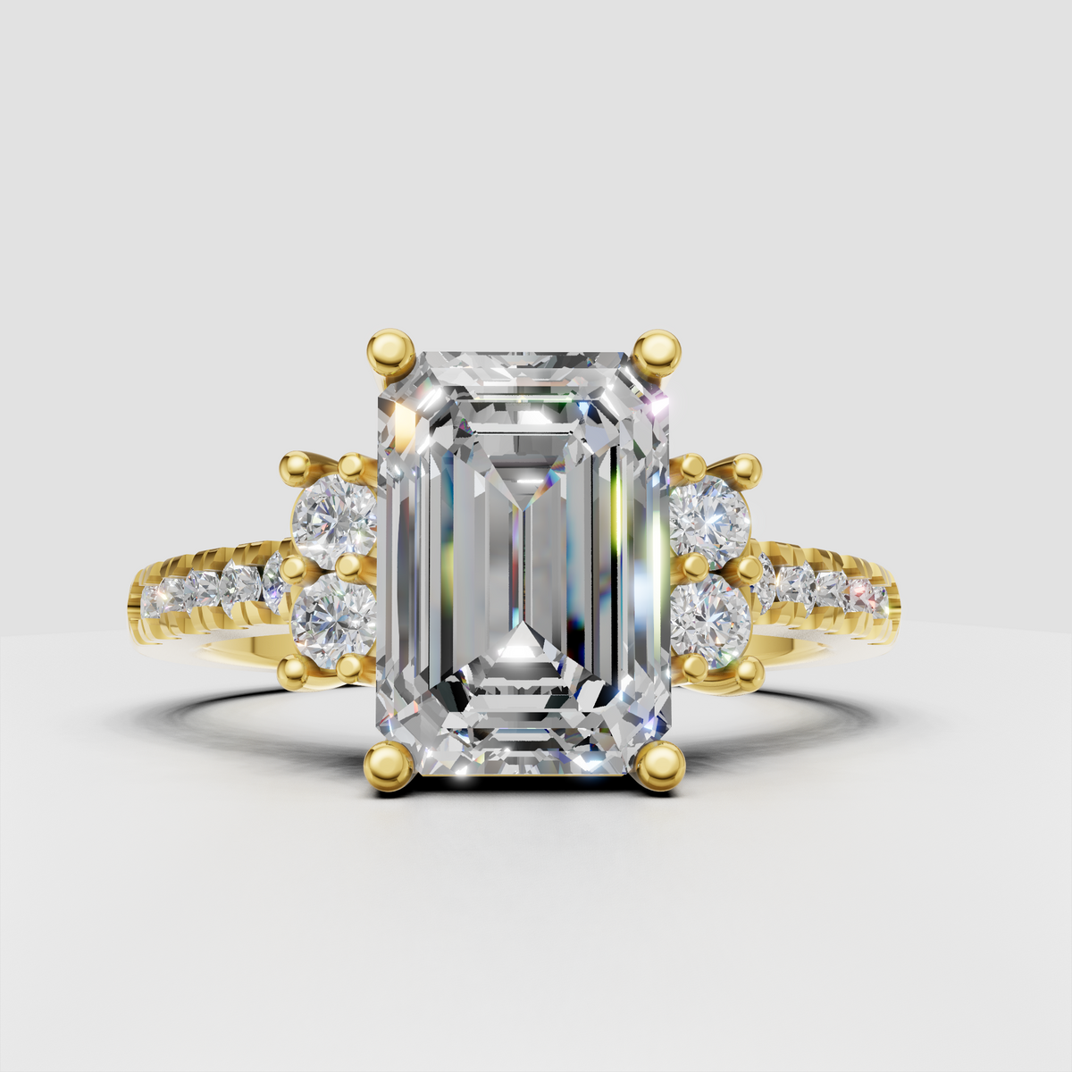 Emerald cut diamond cluster engagement ring with pave side stones