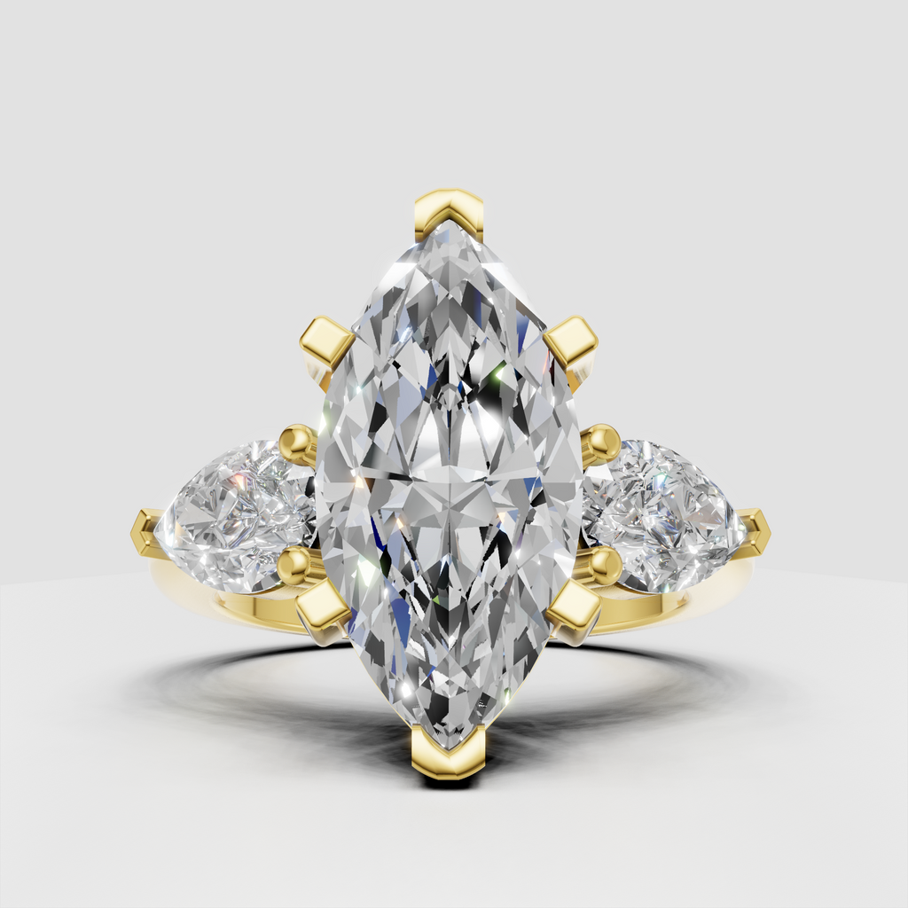 Marquise cut diamond three stone engagement ring with pear side diamonds