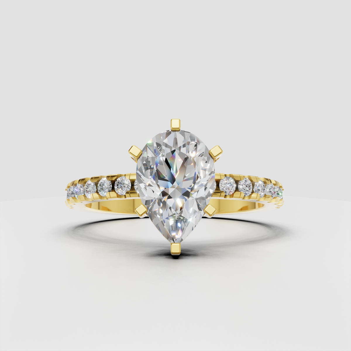 Pear cut diamond solitaire engagement ring with accent diamonds