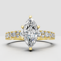 Marquise Diamond cathedral engagement ring with side stones in polished yellow gold