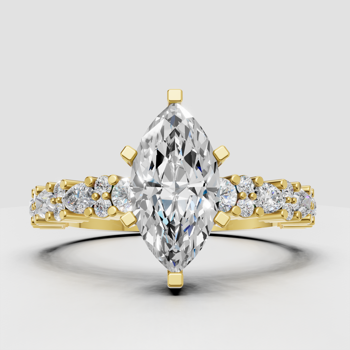 Marquise Diamond cathedral engagement ring with side stones in polished yellow gold