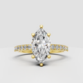 Marquise diamond engagement ring with prong setting and pave band