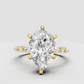 Pear diamond sculptural engagement ring in polished yellow gold
