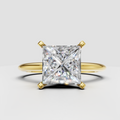 Princess cut diamond four-prong solitaire engagement ring