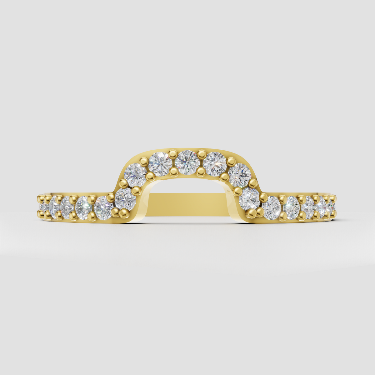 Round diamond shared-prong arched engagement ring in polished yellow gold