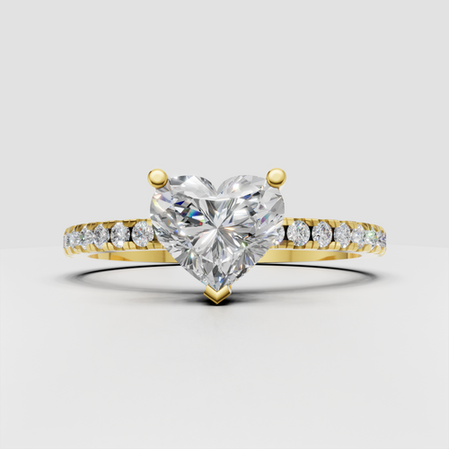 Heart shaped diamond engagement ring with pavé band