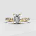 Emerald cut diamond solitaire engagement ring with pave band
