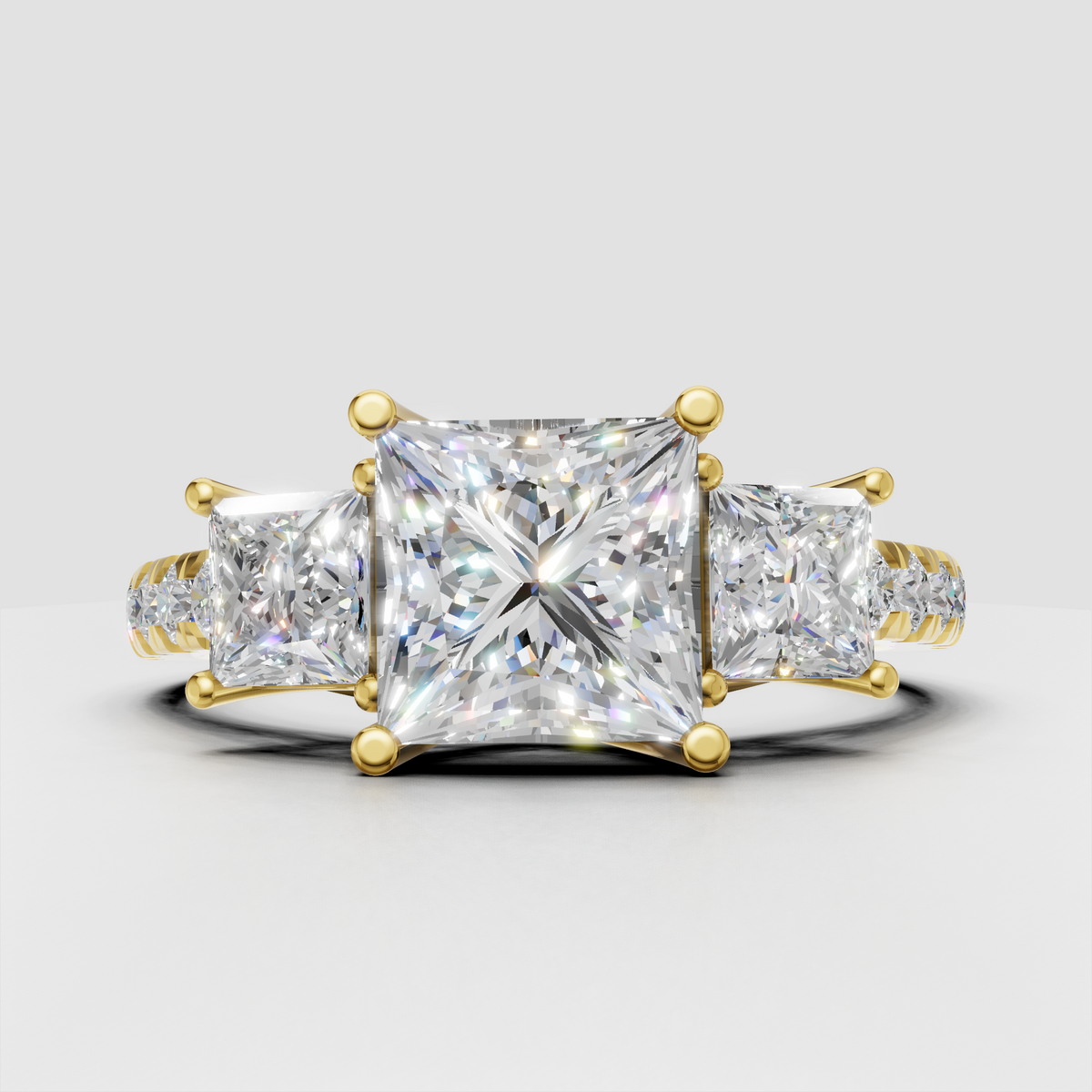 Princess cut diamond three stone engagement ring with pave band
