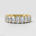 Oval diamond eternity band ring with prong setting